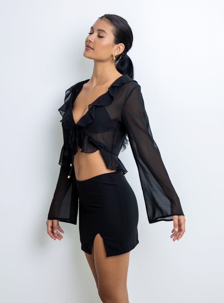 La Michaux black mini skirt with side slit – resortwear luxury fashion #color_black