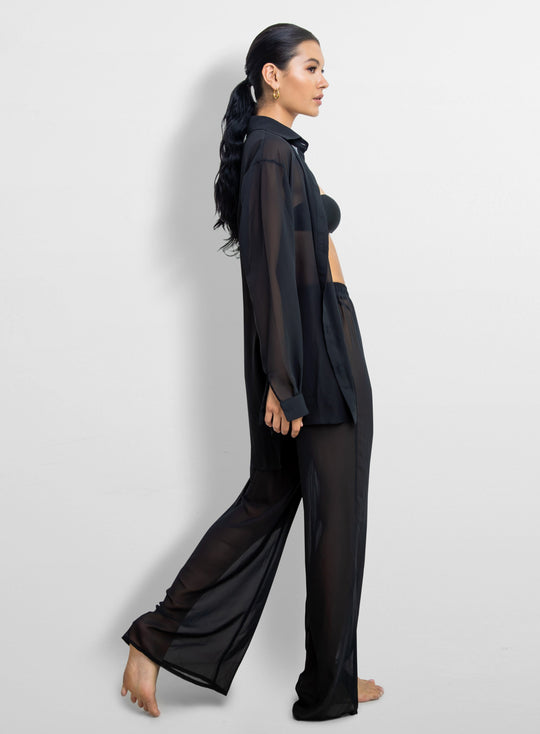 La Michaux black sheer Shirt with gold buttons, long sleeves, classic collar, luxury resortwear for women #color_black