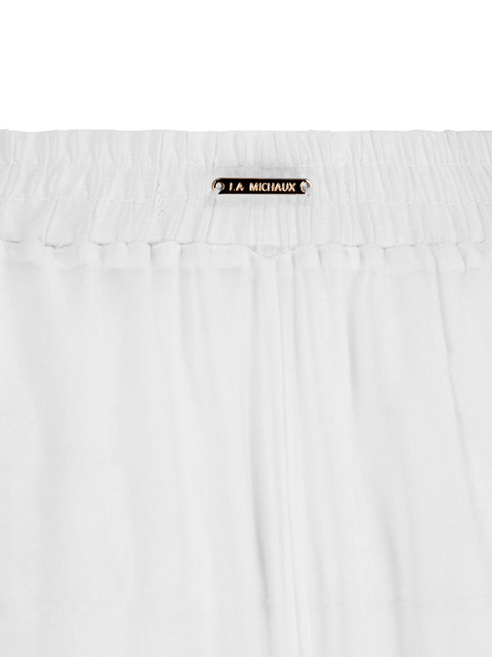 La Michaux women’s white luxury wide-leg beach pants with elastic waistband, front view. #color_white