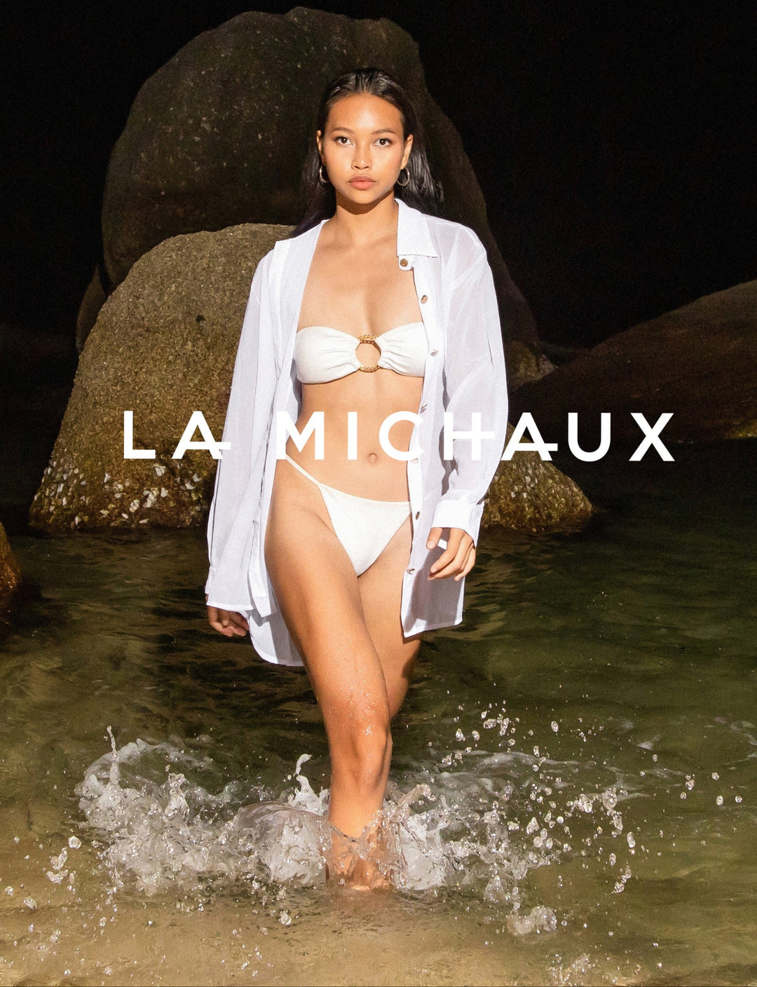 Supergirl in La Michaux white sheer Shirt with gold buttons, long sleeves, classic collar, luxury resortwear for women #color_white